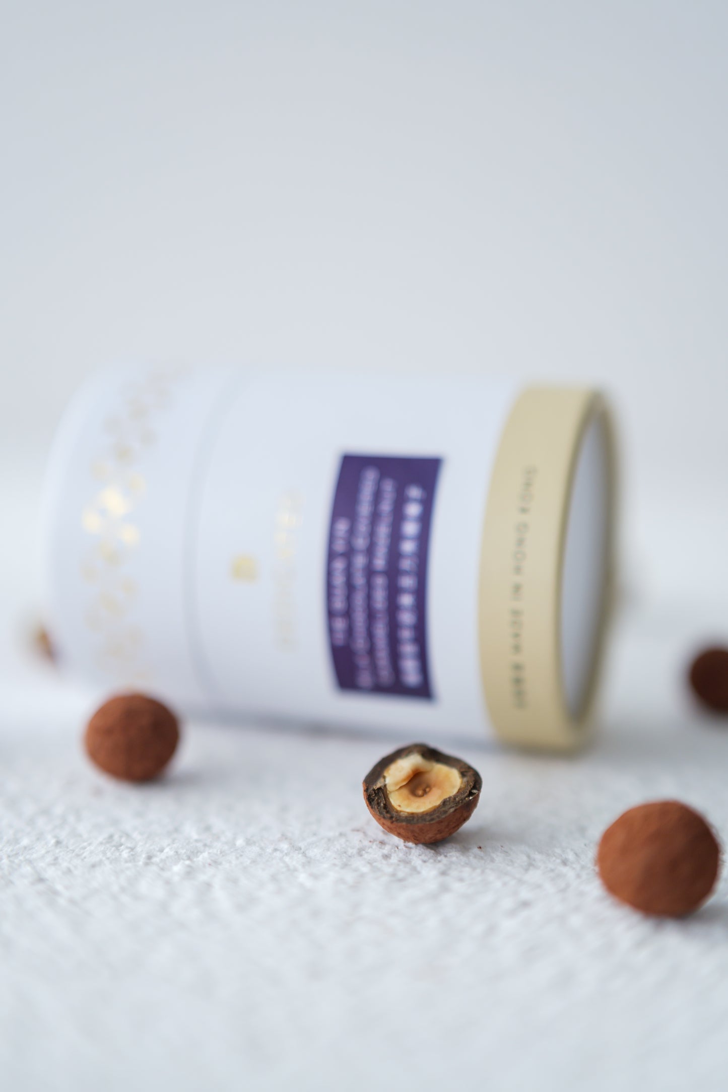 TIE GUAN YIN MILK CHOCOLATE-COVERED HAZELNUTS