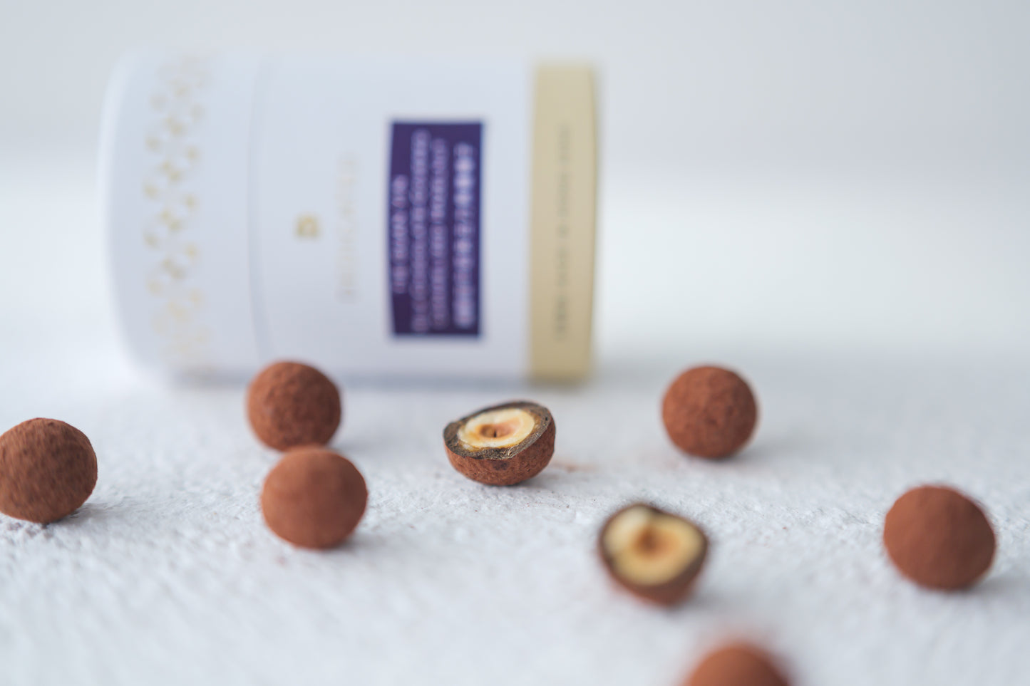 TIE GUAN YIN MILK CHOCOLATE-COVERED HAZELNUTS